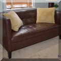 F33. Leatherette loveseat. 30&rdquo;h x 62&rdquo;w x 30&rdquo;d 